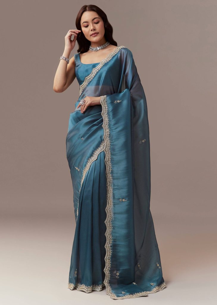 Teal Blue Organza Saree With Cutdana Beads And Sequin Embroidery


