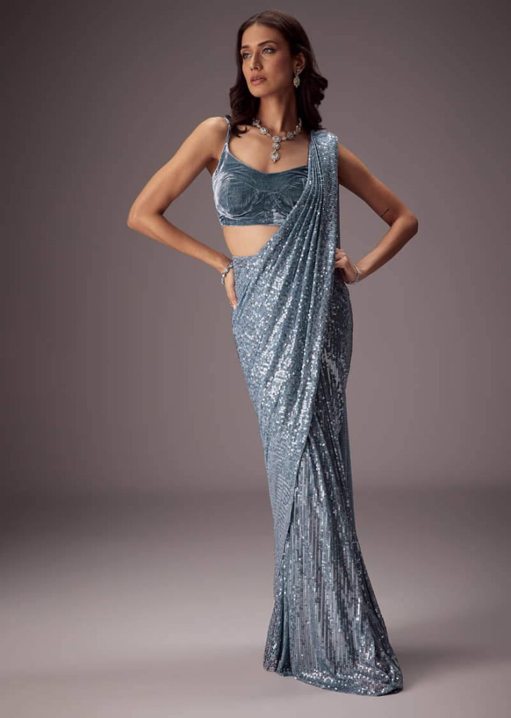 Steel Blue Sequin Saree Paired With A Plush Velvet blouse

