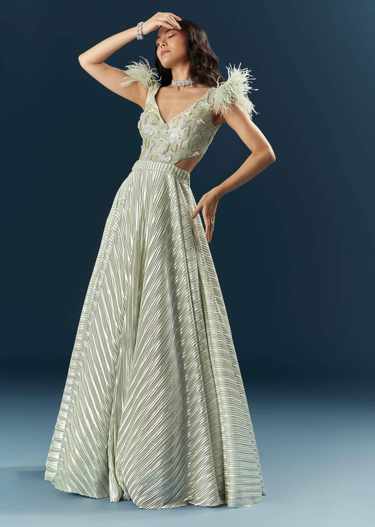 Off White Imported Lycra Bridal Gown With Heavy Embroidery And Feather Work

