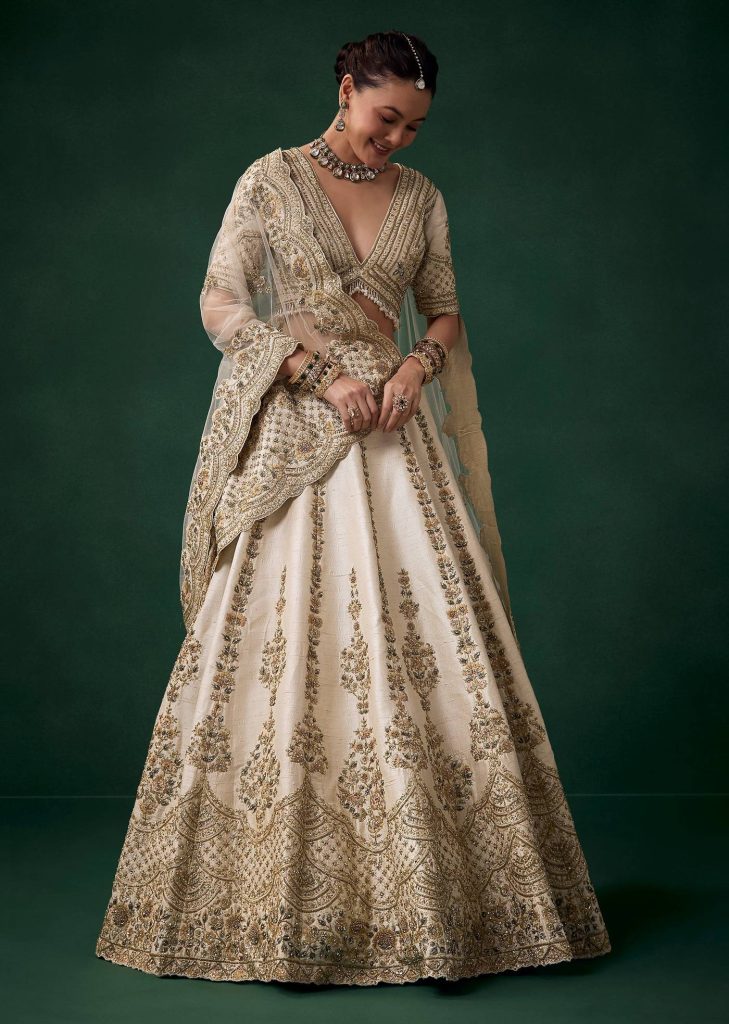 Cream Zari Embroidered Bridal Lehenga Sets

