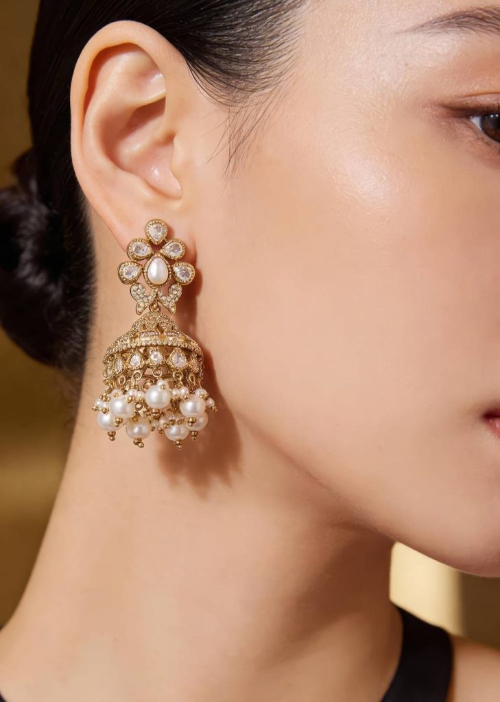 Gold Finish Jhumka Earrings In Polki With White Simulated Pearls

